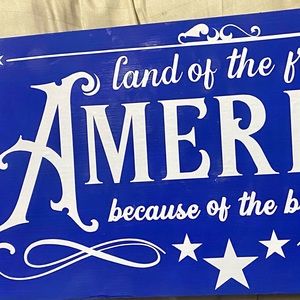 NWT….custom made sign that says America…land of the free because of the brave…